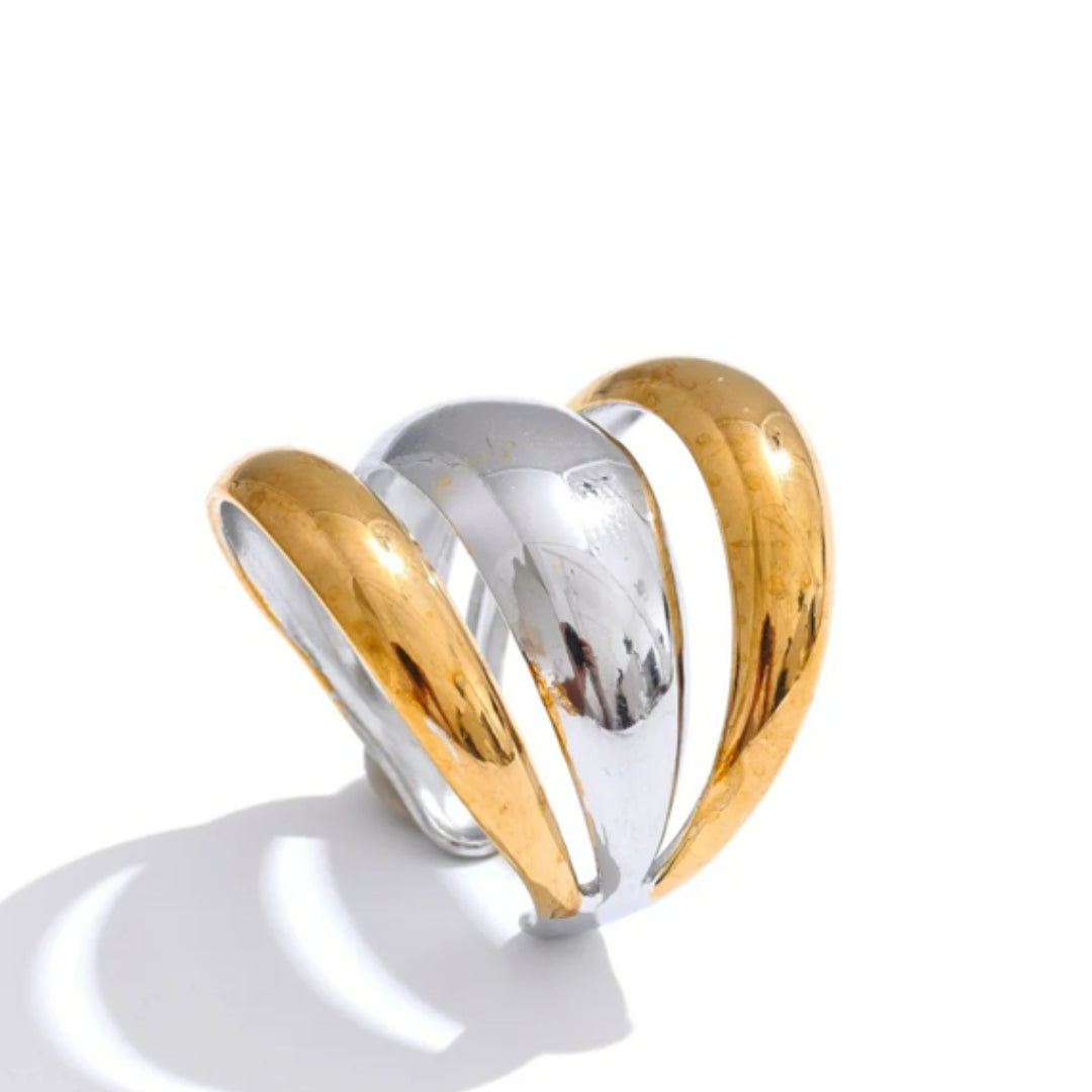 Joya geométrica en acero inoxidable dorado – lenorajewelry.com/anillo-geometrico-capas-doradas
anillo geométrico, joyería de acero inoxidable, anillo dorado para mujer, joyas modernas, regalo elegante, lenora joyas, diseño ajustable, envío rápido, oro PVD, accesorio único