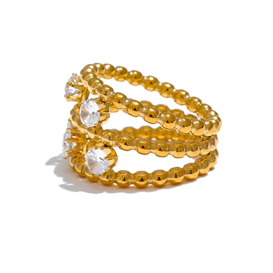 Anillo Lumina Étera en oro 18k con circonitas – lenorajewelry.com/anillo-lumina-etera-oro-circonitas, anillo de oro, joyería fina mujer, circonitas cubicas, acero inoxidable 316L, regalo elegante, anillo ajustable, lenora, joyas con platina, moda sostenible, lujo accesible