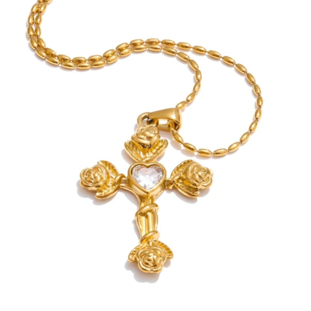 Collar Cruz Flor de Luz con circonita rosa y oro 18k – lenorajewelry.com/collar-cruz-flor-luz-rosa
collar de cruz, joyería religiosa, circonita rosa, regalo mujer fe, acero inoxidable oro, LENORA, collar ajustable, joyería chapada platina, colgante espiritual