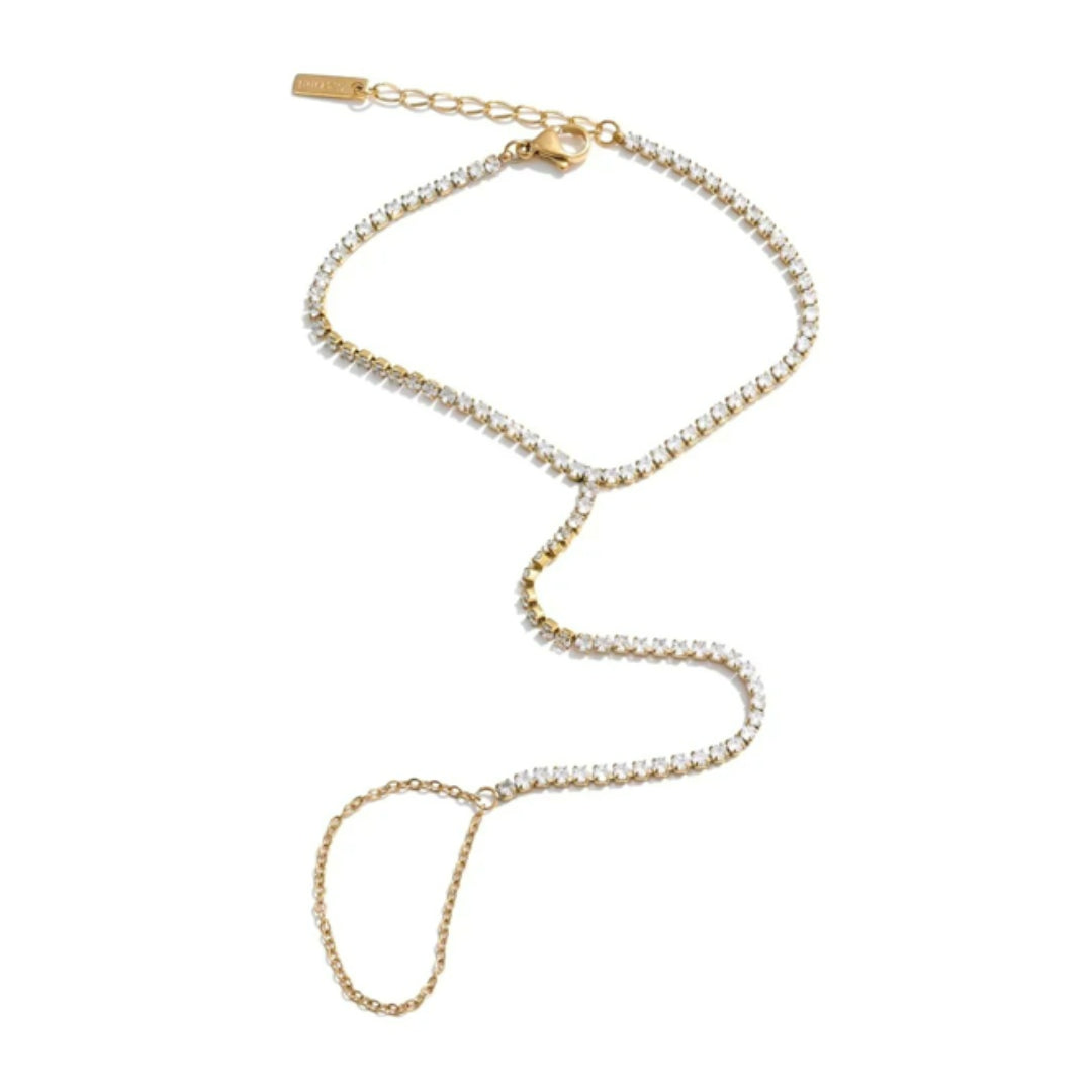 Detalle de cadena ajustable para dedo en acero inoxidable – lenorajewelry.com/handpiece-dorado-ajustable-lenora handpiece dorado, pulsera de dedo, joyas à prova d'água, acero inoxidable, zircônia cúbica, moda 2024, Lenora