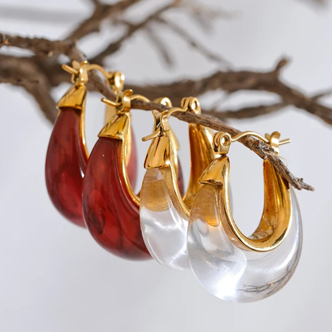 Pendientes Aro Éter Dorado Oro - Diseño Hueco Hipoalergénico – lenorajewelry.com/pendientes-aro-eter-dorado-oro-hipoalergenico , aros dorados, pendientes de acero inoxidable, joyería hipoalergénica, accesorios para mujeres, regalo elegante, lenora jewelry, pendientes de fiesta