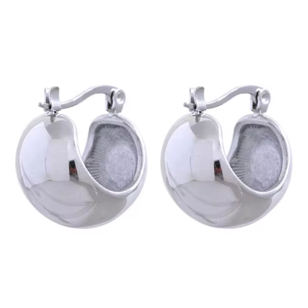 pendientes geométricos, pendientes Astra, pendientes de acero inoxidable, pendientes baño de oro 18K, joyería elegante, bisutería geométrica, pendientes modernos, pendientes resistentes