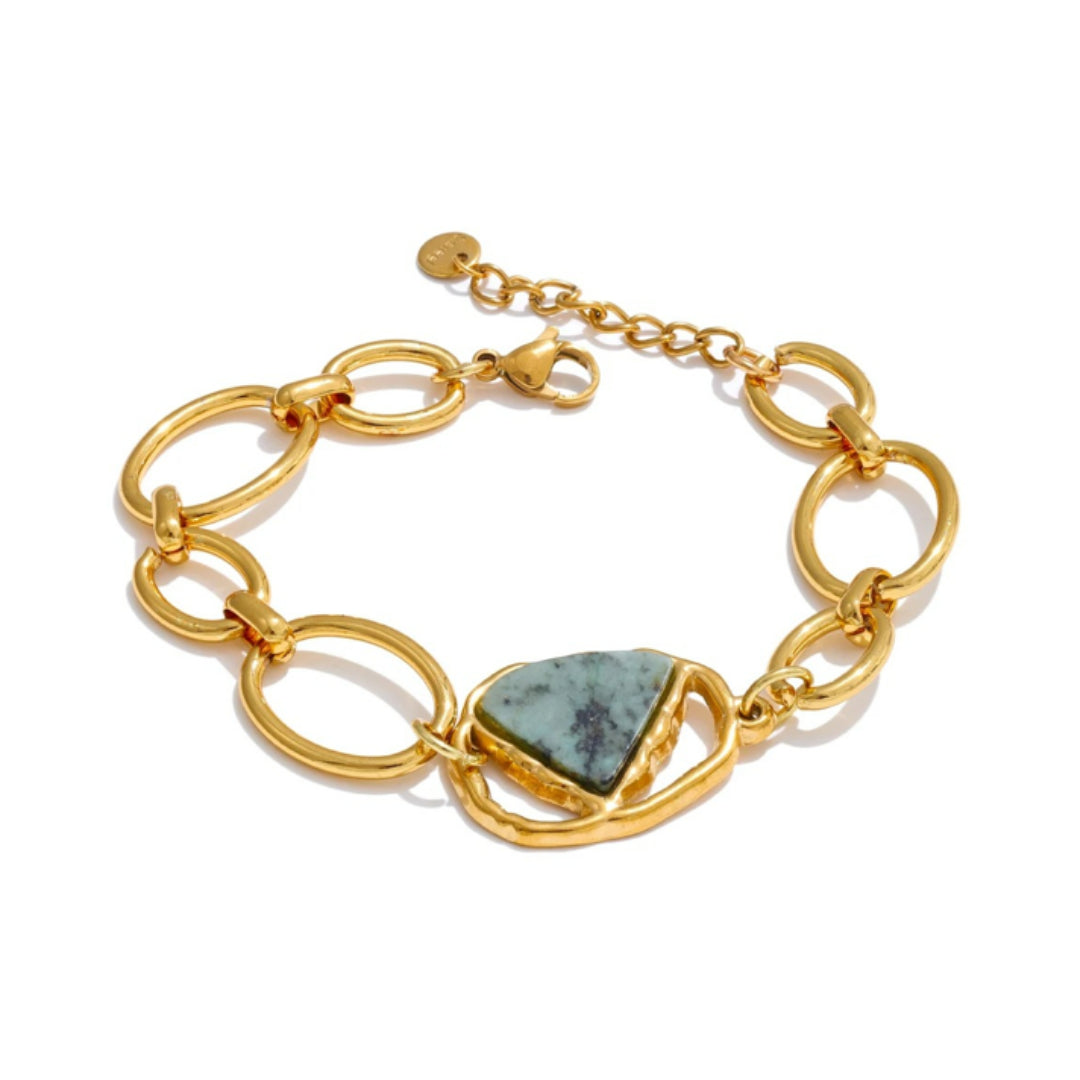 Pulsera geométrica en acero inoxidable bañado oro 18K – lenorajewelry.com/pulsera-savia-dorada
pulsera acero inoxidable, joyería con piedra natural, pulsera oro 18k, joyas geométricas, regalo mujer elegante, pulsera de verano, lenora jewelry, accesorios de lujo
