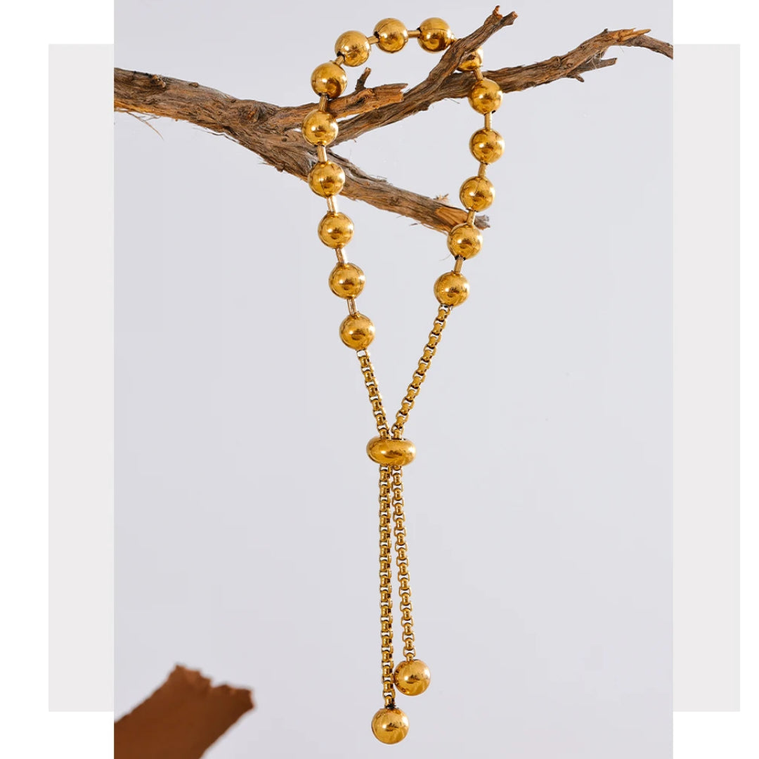 Pulsera Verano Áureo cuentas ajustables oro 18k verano – lenorajewelry.com/pulsera-verano-aureo-oro-18k
pulsera verano, joyería oro 18k, acero inoxidable, pulsera de cuentas, joyería diaria, joyas resistentes agua, regalo mujer elegante, moda playera, accesorios ajustables, Lenora Jewelry