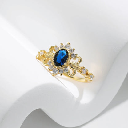 Anillo encanto corona ovalado con circonia azul 
