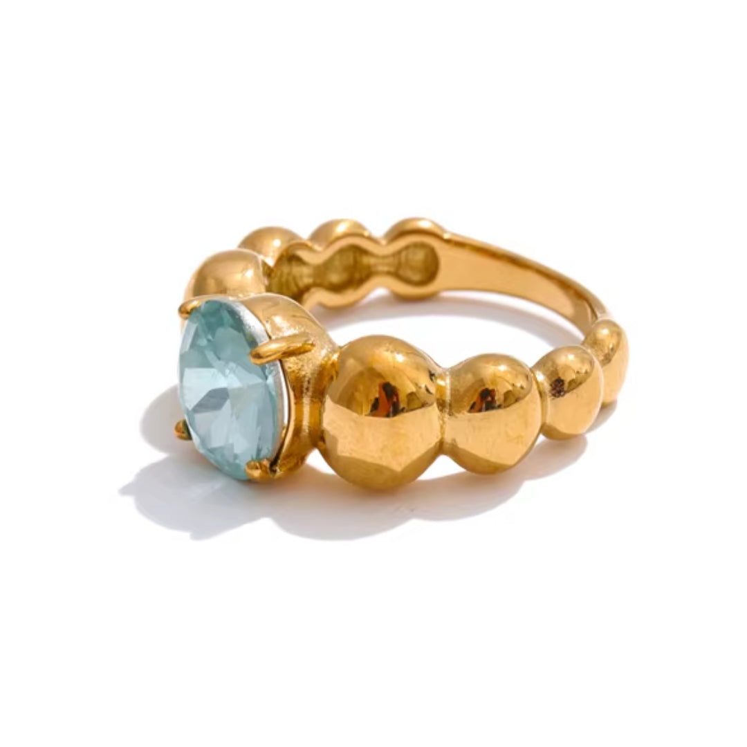 Anillo geométrico de acero inoxidable 316L – lenorajewelry.com/anillo-aura-azul-oro
anillo de zircônia azul, joyería fina para mujeres, accesorios bañados en oro, anillo geométrico, regalo elegante, LENORA