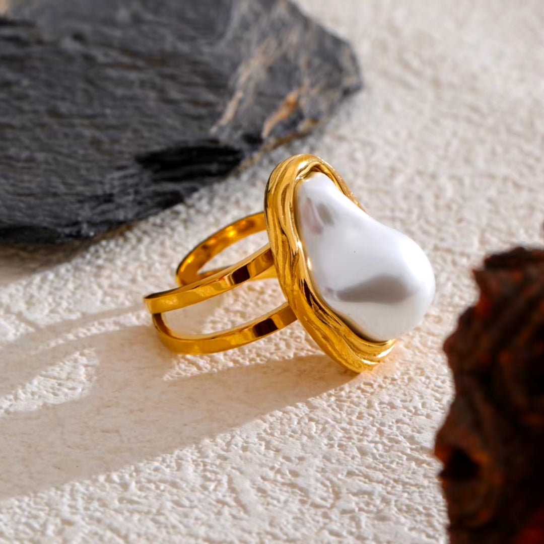 Anillo Barroco de Perla Ajustable en Acero Dorado con Diseño Vintage
https://lenorajewelry.com/anillo-barroco-perla-vintage-ajustable-acero-dorado