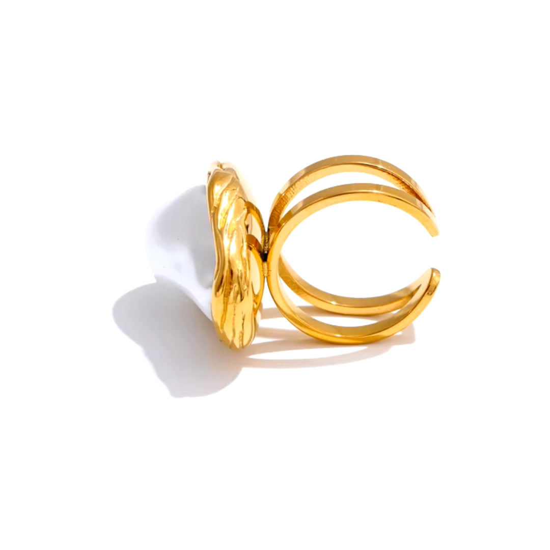 Anillo Barroco de Perla Ajustable en Acero Dorado con Diseño Vintage
https://lenorajewelry.com/anillo-barroco-perla-vintage-ajustable-acero-dorado