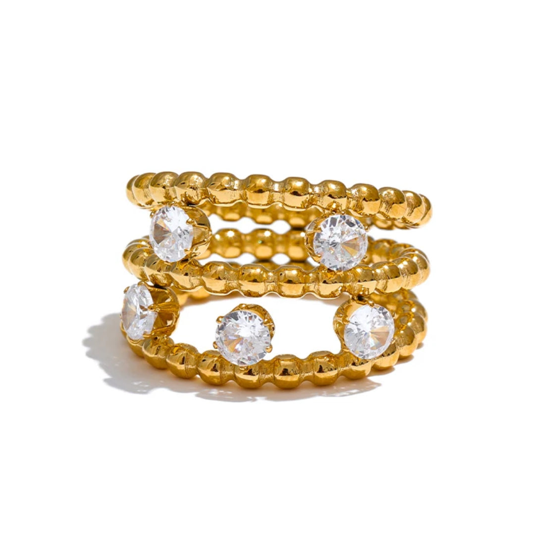 Anillo Lumina Étera en oro 18k con circonitas – lenorajewelry.com/anillo-lumina-etera-oro-circonitas, anillo de oro, joyería fina mujer, circonitas cubicas, acero inoxidable 316L, regalo elegante, anillo ajustable, lenora, joyas con platina, moda sostenible, lujo accesible