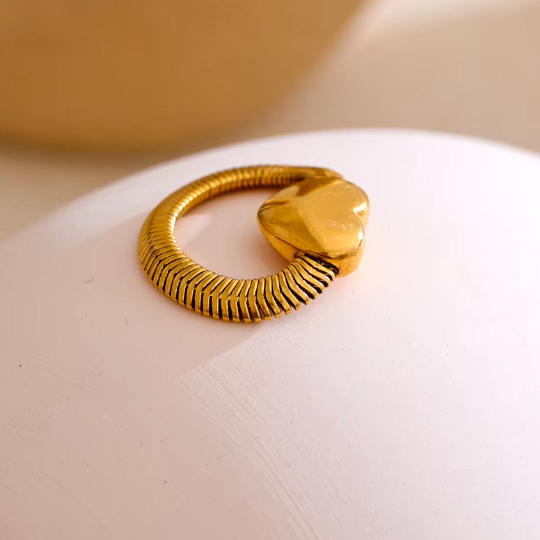 anillo serpiente dorado, joyería de declaración, anillo corazón, anillo geométrico, joyería de moda