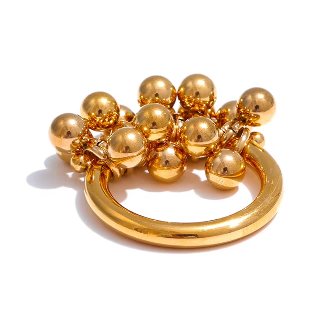 Anillo de capas dorado con cuentas redondeadas, Joyería en acero inoxidable con baño de oro 18K, Anillo geométrico y moderno para mujeres elegantes
https://lenorajewelry.com/anillo-capas-cuentas-acero-inoxidable-oro