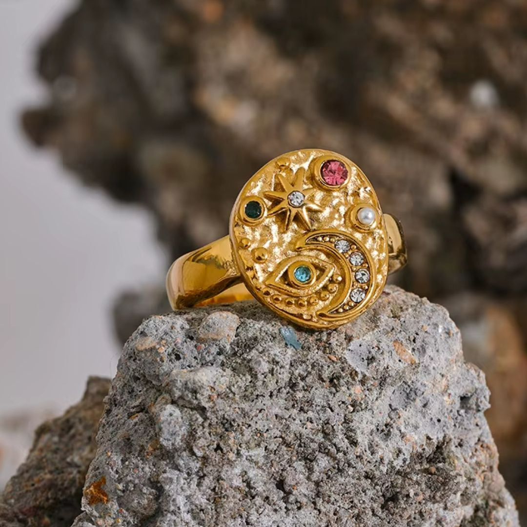 https://lenorajewelry.com/anillo-celestial-dorado-con-zirconias-charms
