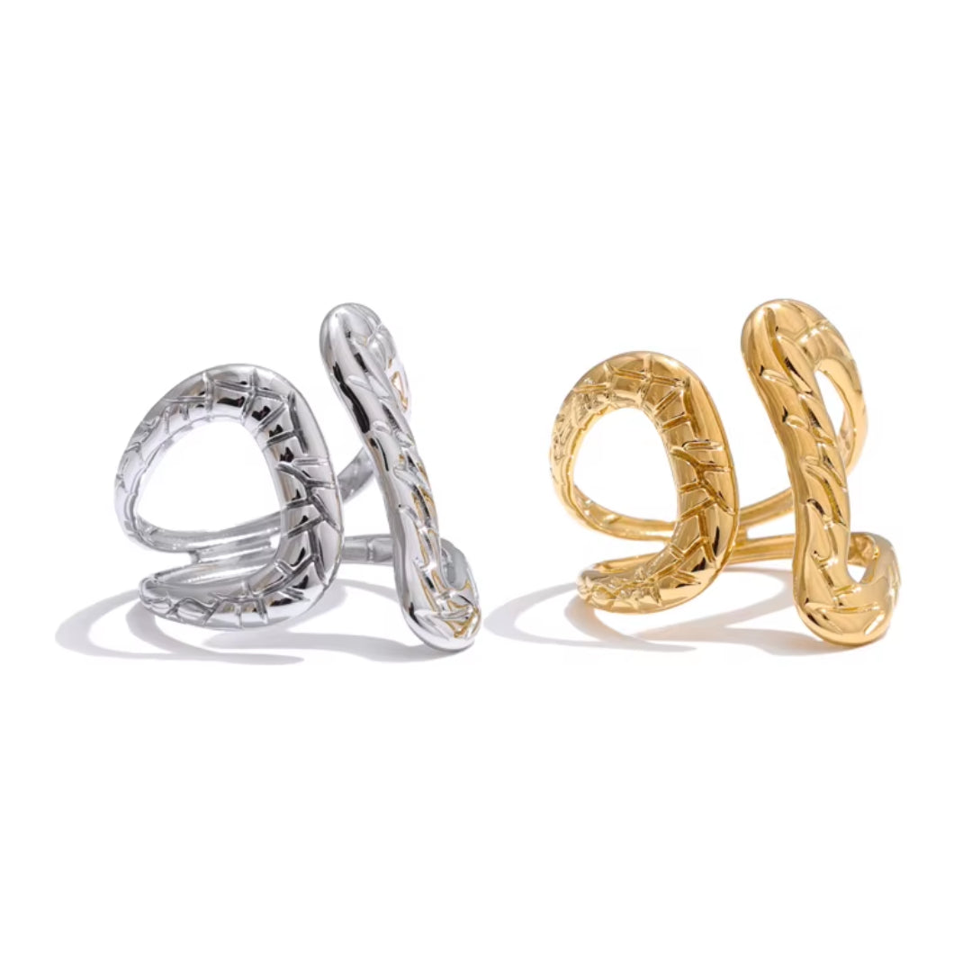 Anillo geométrico ajustable de acero inoxidable chapado en oro 18K
Diseño hueco y minimalista, ideal para mujeres modernas
Accesorio de joyería individualista para todas las ocasiones