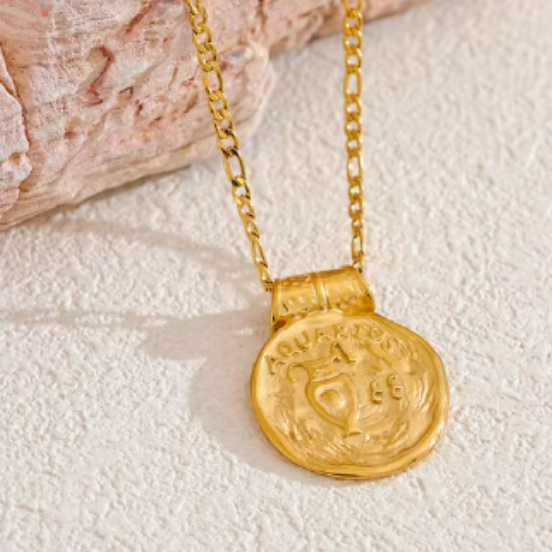 Collar de constelaciones dorado con diseño vintage, Collar zodiacal martillado en acero inoxidable, Joyería dorada 18k con signos zodiacales
https://lenorajewelry.com/collar-constelaciones-dorado-vintage-martillado