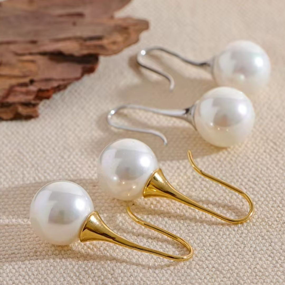 aretes elegantes, perlas imitación, joyería coreana, aretes geométricos, joyería de acero inoxidable, aretes de baño en oro, accesorios https://lenorajewelry.com/aretes-perlas-elegantes-geométricos-oro-plata

