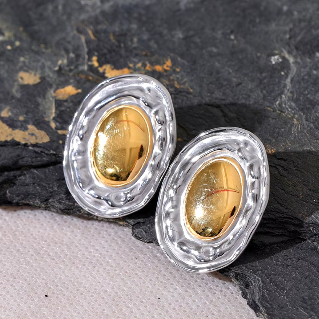 Aretes redondos dorados de acero inoxidable con textura elegante
https://lenorajewelry.com/aretes-redondos-acero-316l-bano-oro