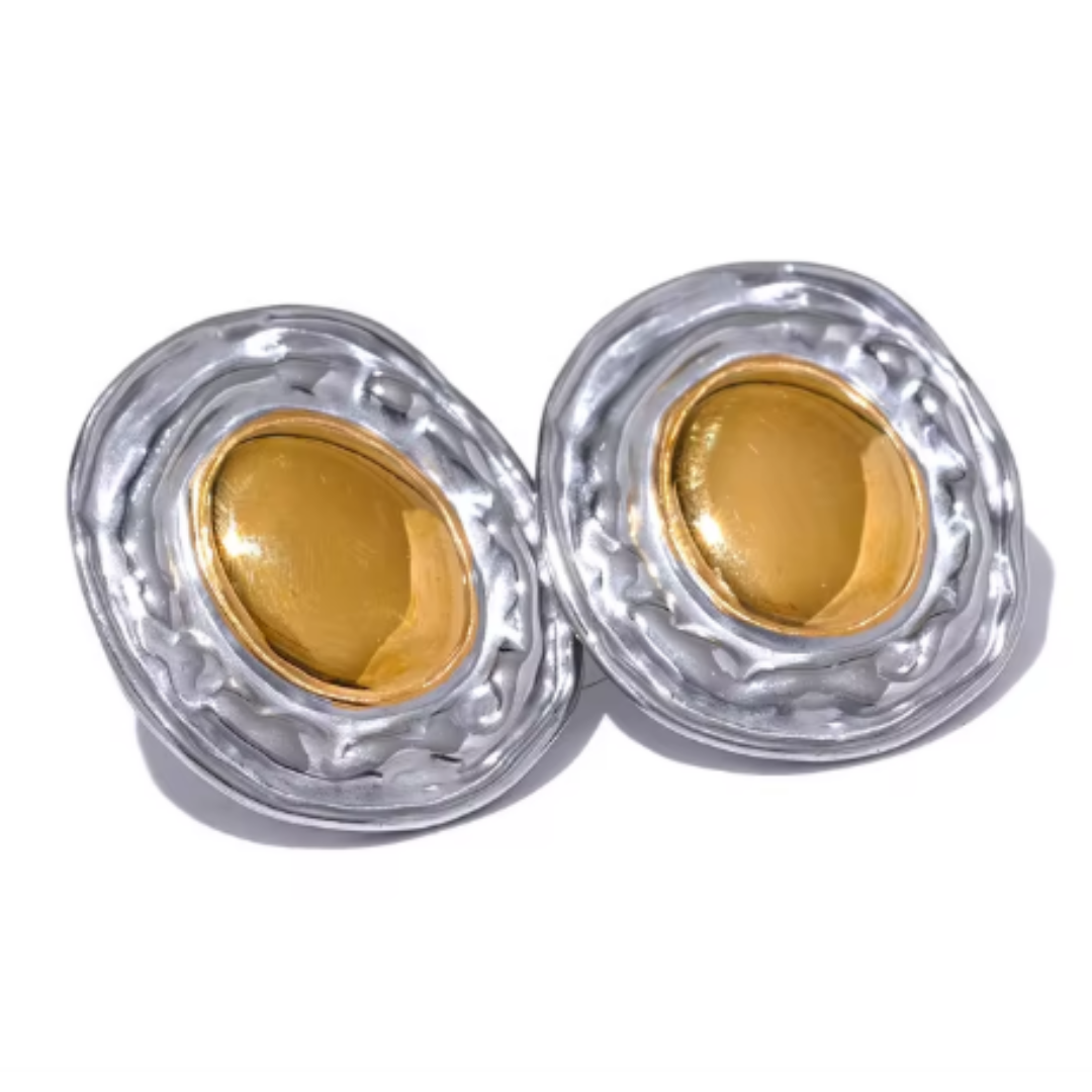 Aretes redondos dorados de acero inoxidable con textura elegante
https://lenorajewelry.com/aretes-redondos-acero-316l-bano-oro