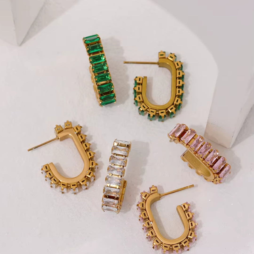 Aretes tipo prisionero con zirconia cúbica y baño de oro, Acero inoxidable 316L con zirconia cúbica brillante https://lenorajewelry.com/aretes-acero-inoxidable-zirconia-cubica-destellos-divinos