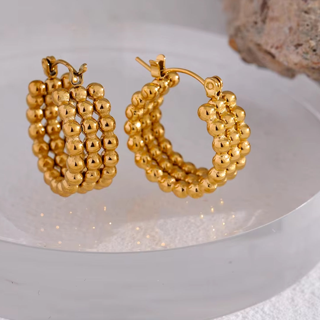 aretes de acero inoxidable, aros dorados 18K, joyería resistente al agua, moda femenina, aretes modernos, joyería dorada, joyería de regalo, aretes para mujer, joyería de moda