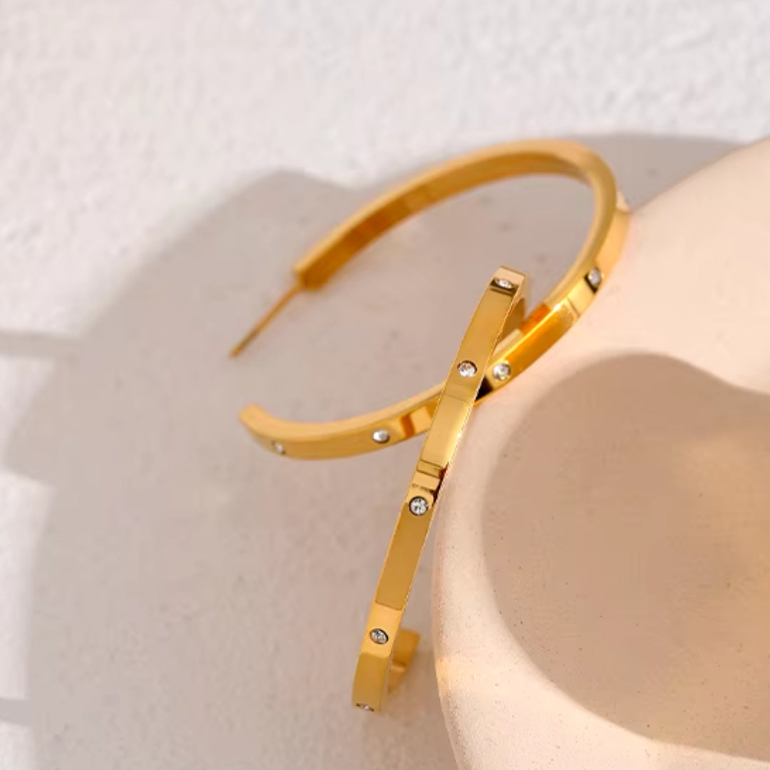 aros dorados, acero inoxidable, zirconia cúbica, joyería minimalista, pendientes grandes, aros de moda, accesorios para mujeres, aros geométricos, joyas resistentes al agua