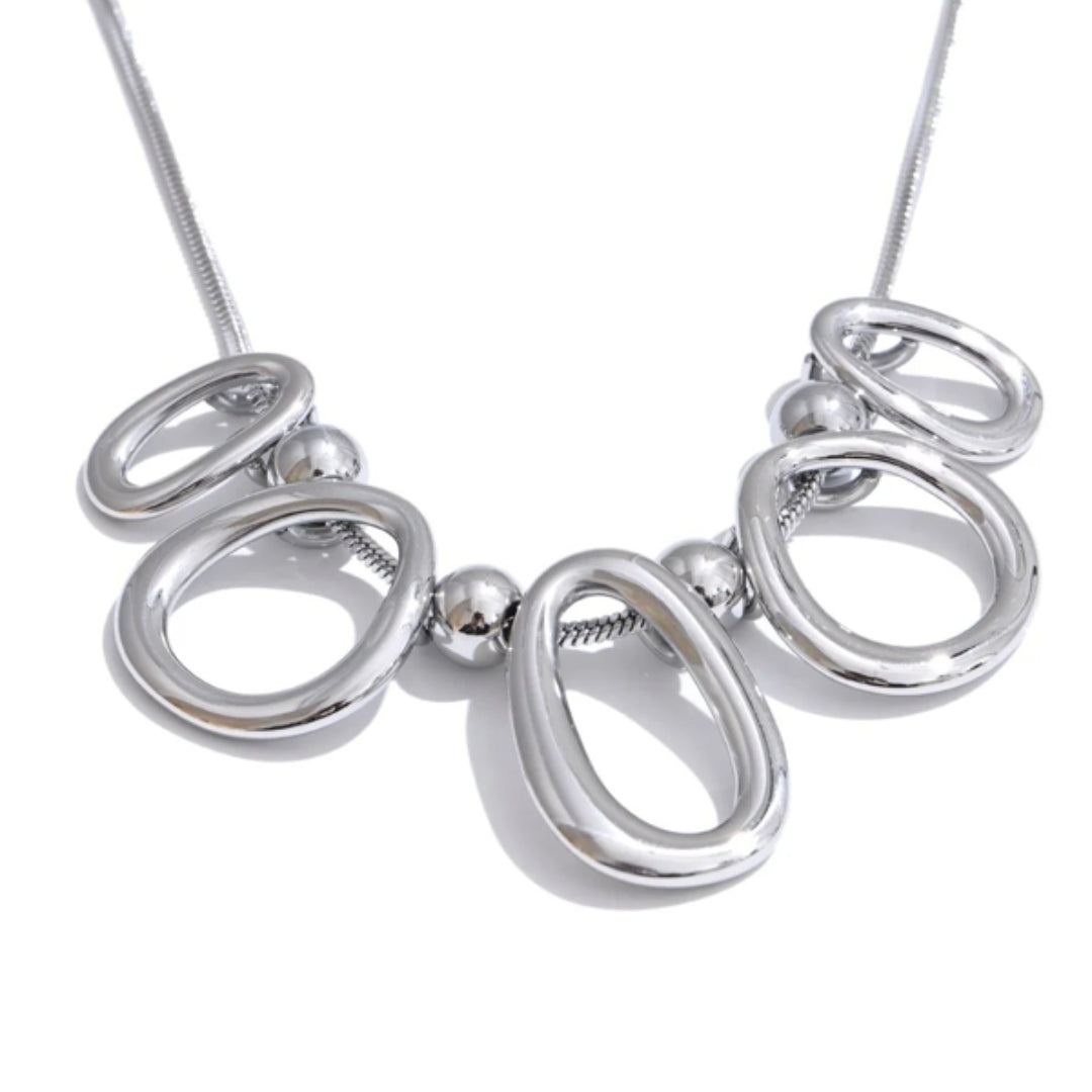 collar personalizado, joyería oro 18k, colgante oval hueco, acero inoxidable resistente, joyas creativas, regalo personalizable, colar ajustable mujer, joyería funcional, diseño geométrico, LENORA