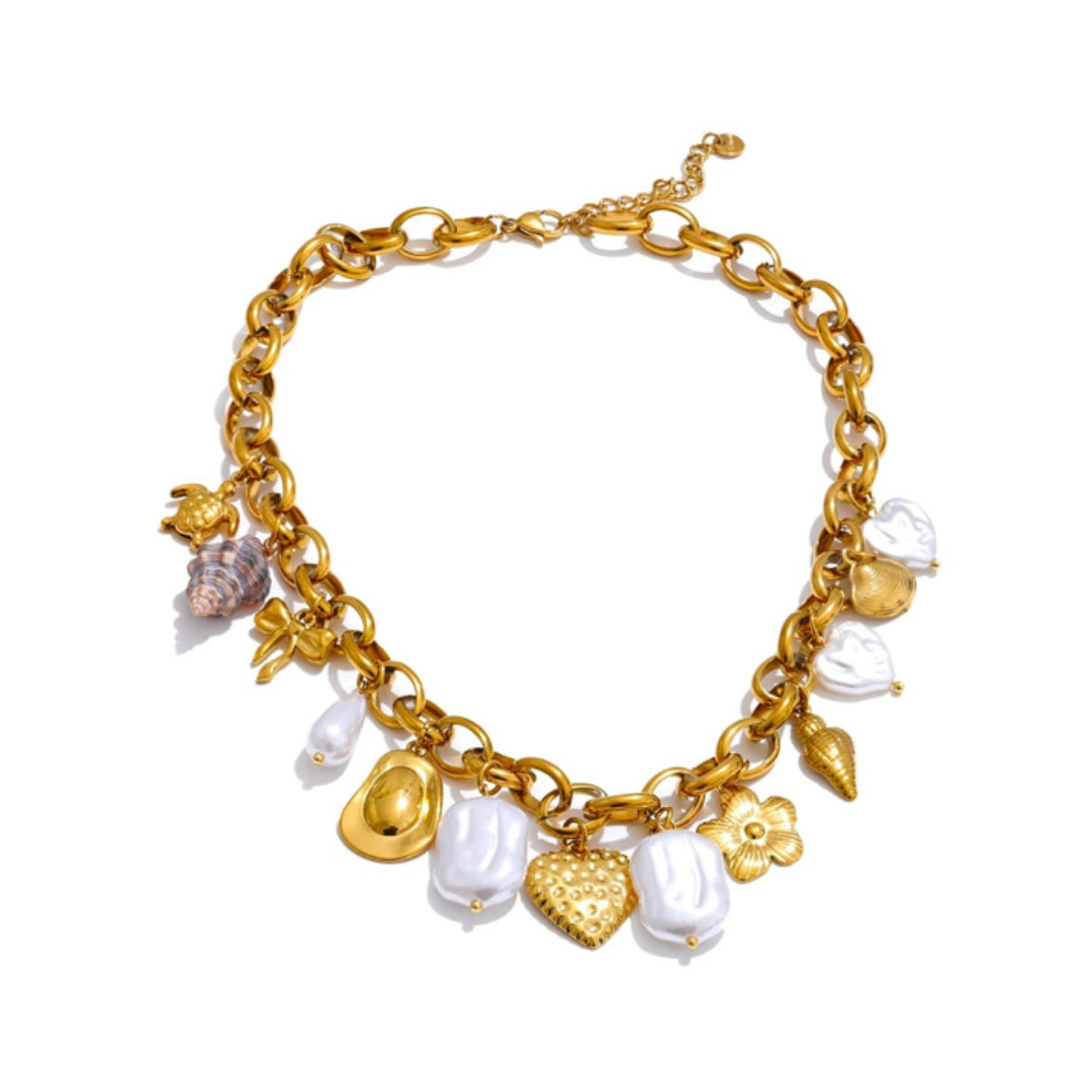 Collar artesanal ajustable para mujer con diseño geométrico - lenorajewelry.com/collar-eter-marina-acero-inoxidable-oro
collar acero inoxidable, joyería artesanal mujer, collar con perlas, joyas baño oro, regalo elegante, joyería marina, LENORA jewelry, collar ajustable, charms concha