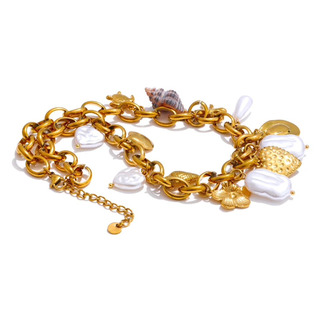 Collar artesanal ajustable para mujer con diseño geométrico - lenorajewelry.com/collar-eter-marina-acero-inoxidable-oro
collar acero inoxidable, joyería artesanal mujer, collar con perlas, joyas baño oro, regalo elegante, joyería marina, LENORA jewelry, collar ajustable, charms concha