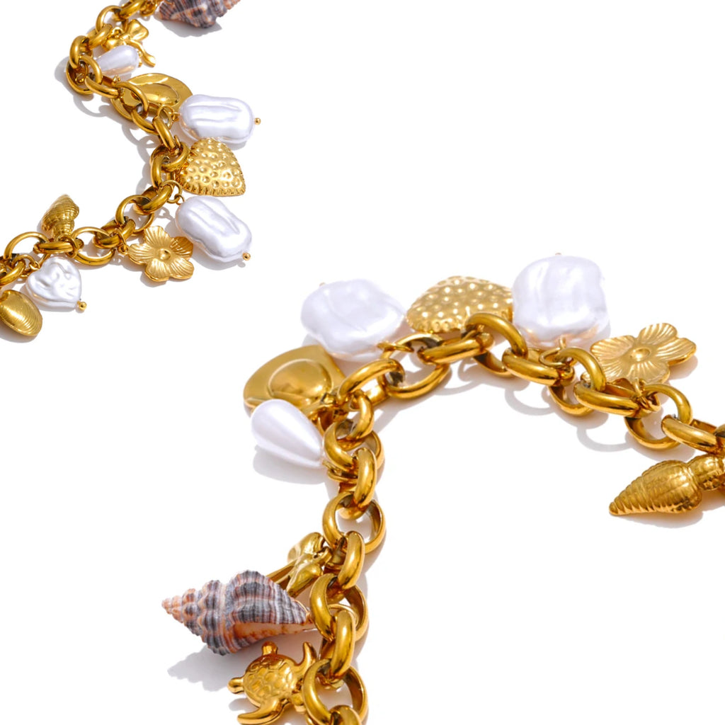 Collar artesanal ajustable para mujer con diseño geométrico - lenorajewelry.com/collar-eter-marina-acero-inoxidable-oro
collar acero inoxidable, joyería artesanal mujer, collar con perlas, joyas baño oro, regalo elegante, joyería marina, LENORA jewelry, collar ajustable, charms concha