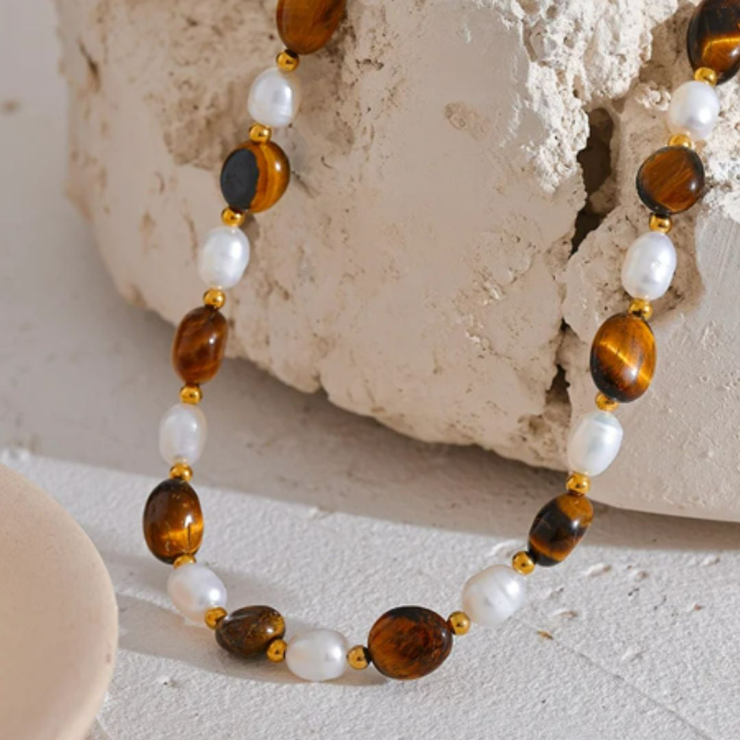 collar de perlas, collar piedra de tigre, collar artesanal, collar dorado, perlas naturales, joyería de moda, bisutería elegante, collar geométrico, accesorios de lujo, joyería mexicana
https://lenorajewelry.com/collar-perlas-piedra-tigre-natural-artesanal