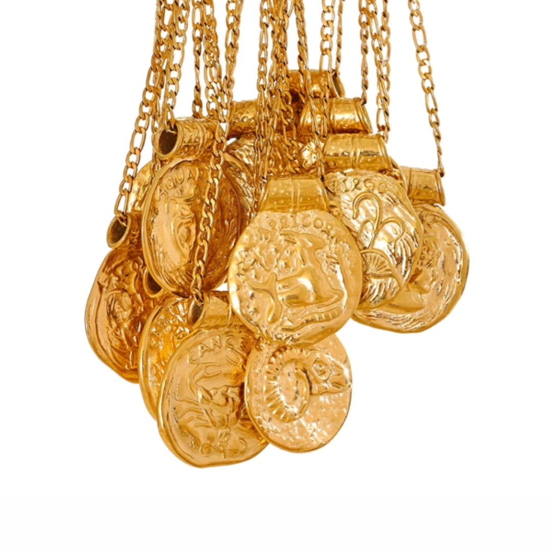 Collar de constelaciones dorado con diseño vintage, Collar zodiacal martillado en acero inoxidable, Joyería dorada 18k con signos zodiacales
https://lenorajewelry.com/collar-constelaciones-dorado-vintage-martillado