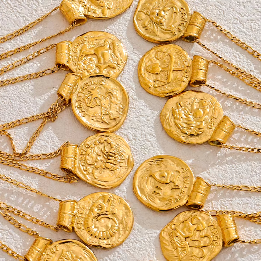 Collar de constelaciones dorado con diseño vintage, Collar zodiacal martillado en acero inoxidable, Joyería dorada 18k con signos zodiacales
https://lenorajewelry.com/collar-constelaciones-dorado-vintage-martillado