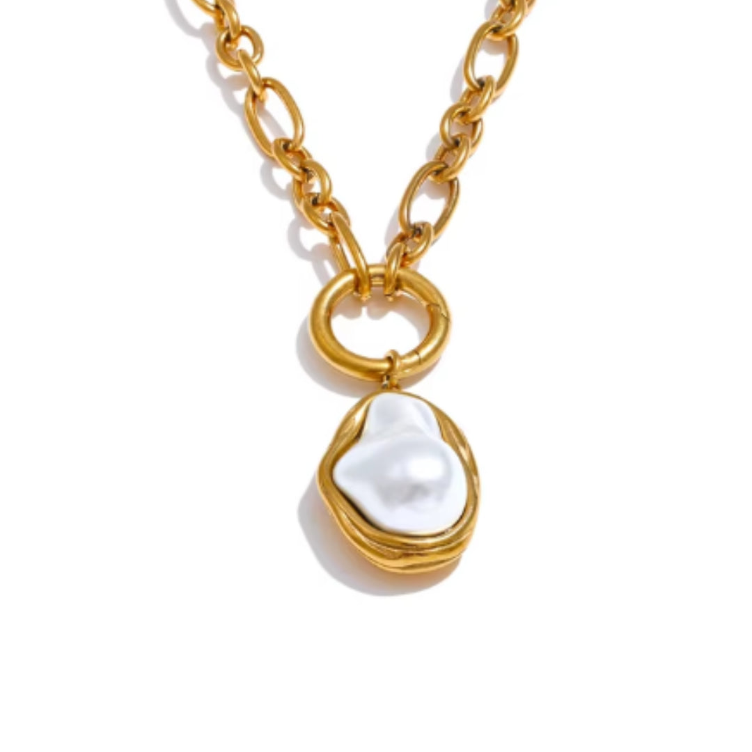 Collar de perla barroco con baño de oro 18K, Collar elegante de cadena dorada y colgante de perla, Joyería moderna con perla geométrica y estilo vintage
https://lenorajewelry.com/collar-barroco-perla-dorada-cadena-18k-pvd
