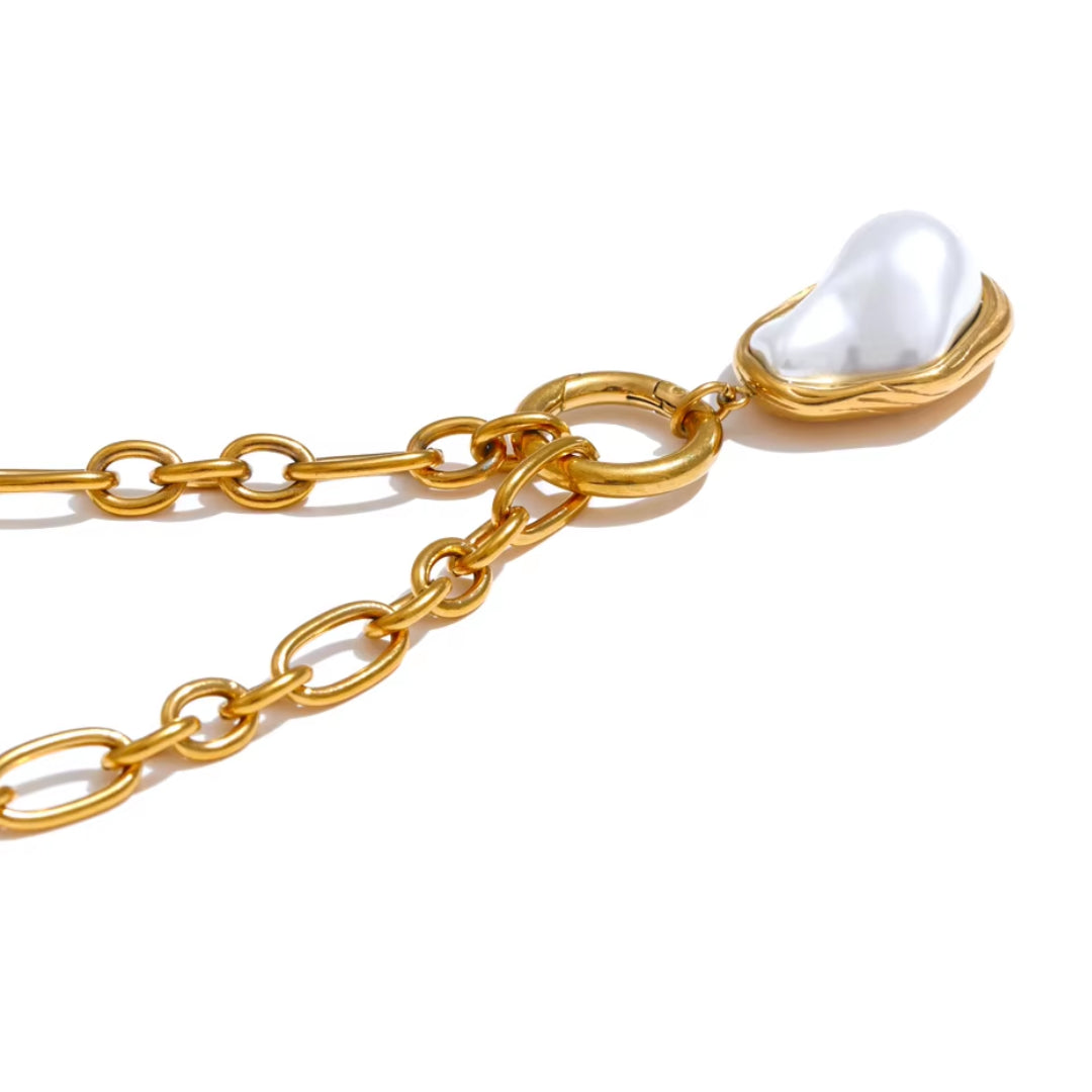 Collar de perla barroco con baño de oro 18K, Collar elegante de cadena dorada y colgante de perla, Joyería moderna con perla geométrica y estilo vintage
https://lenorajewelry.com/collar-barroco-perla-dorada-cadena-18k-pvd