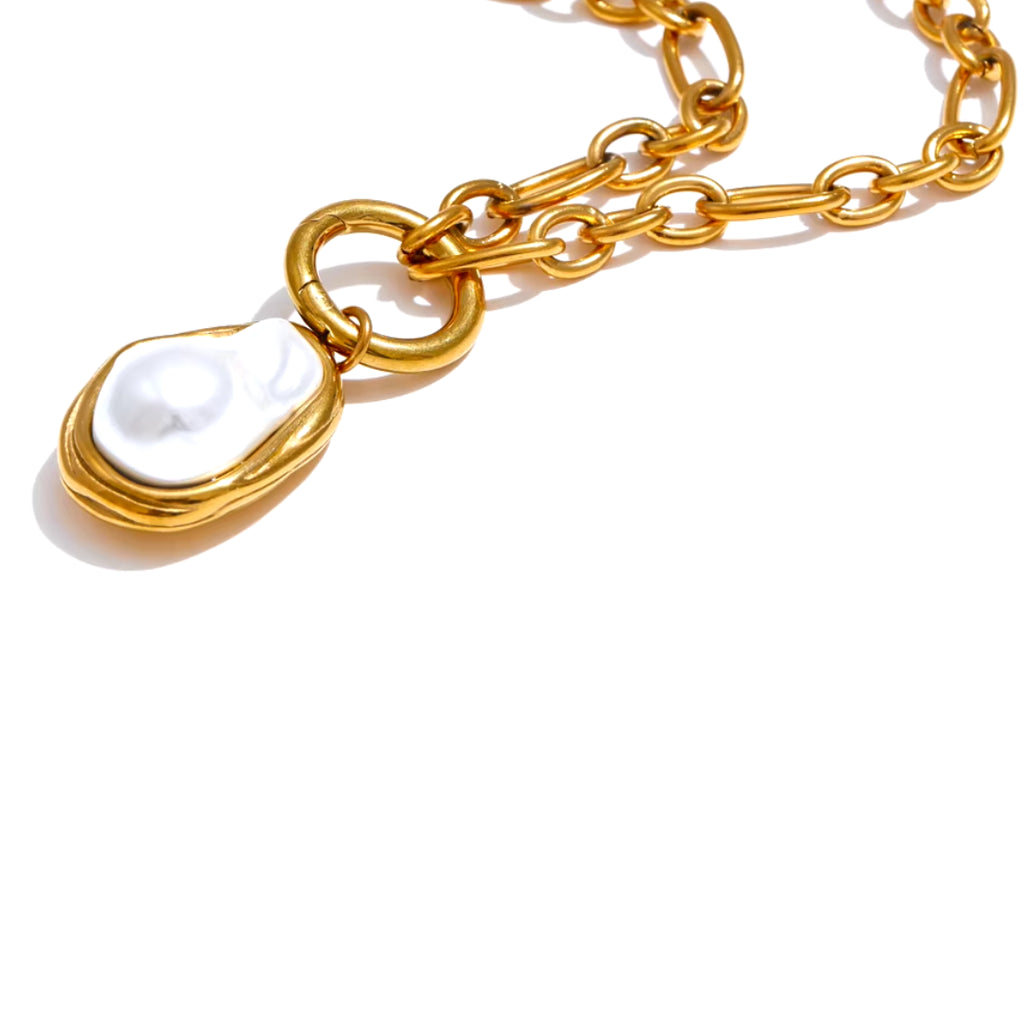 Collar de perla barroco con baño de oro 18K, Collar elegante de cadena dorada y colgante de perla, Joyería moderna con perla geométrica y estilo vintage
https://lenorajewelry.com/collar-barroco-perla-dorada-cadena-18k-pvd