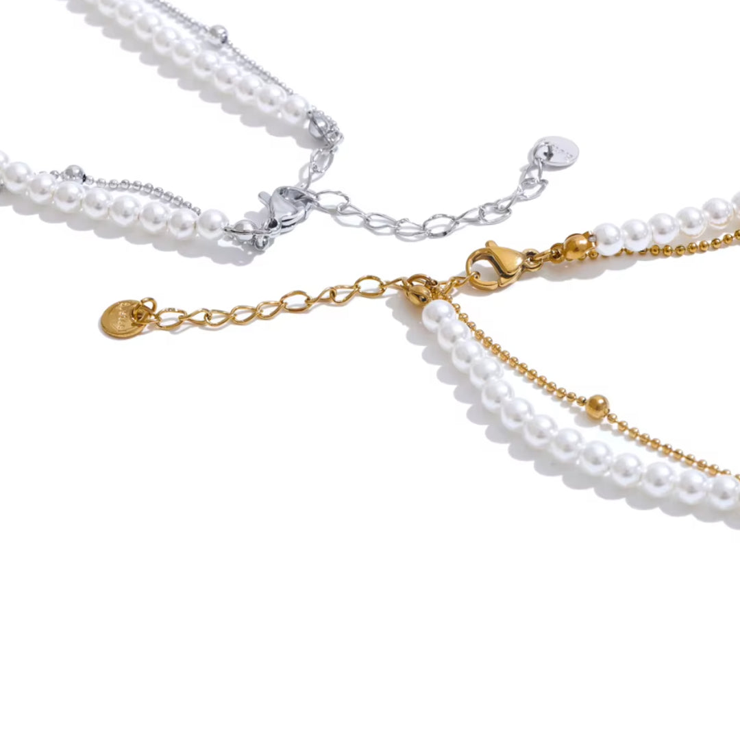 https://lenorajewelry.com/collar-doble-perlas-corazon-oro-plata