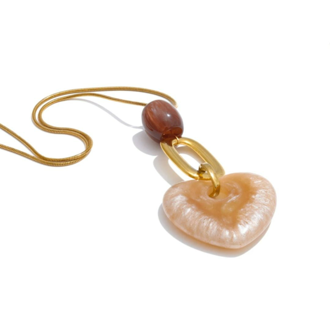 collar largo, collar de suéter, joyería geométrica, colgante corazón, resina acrílica, collar chapado en oro, accesorio resistente, joyería de otoño, moda de invierno, collar dorado para mujer
https://lenorajewelry.com/collar-largo-corazon-dorado-resina-acrilica