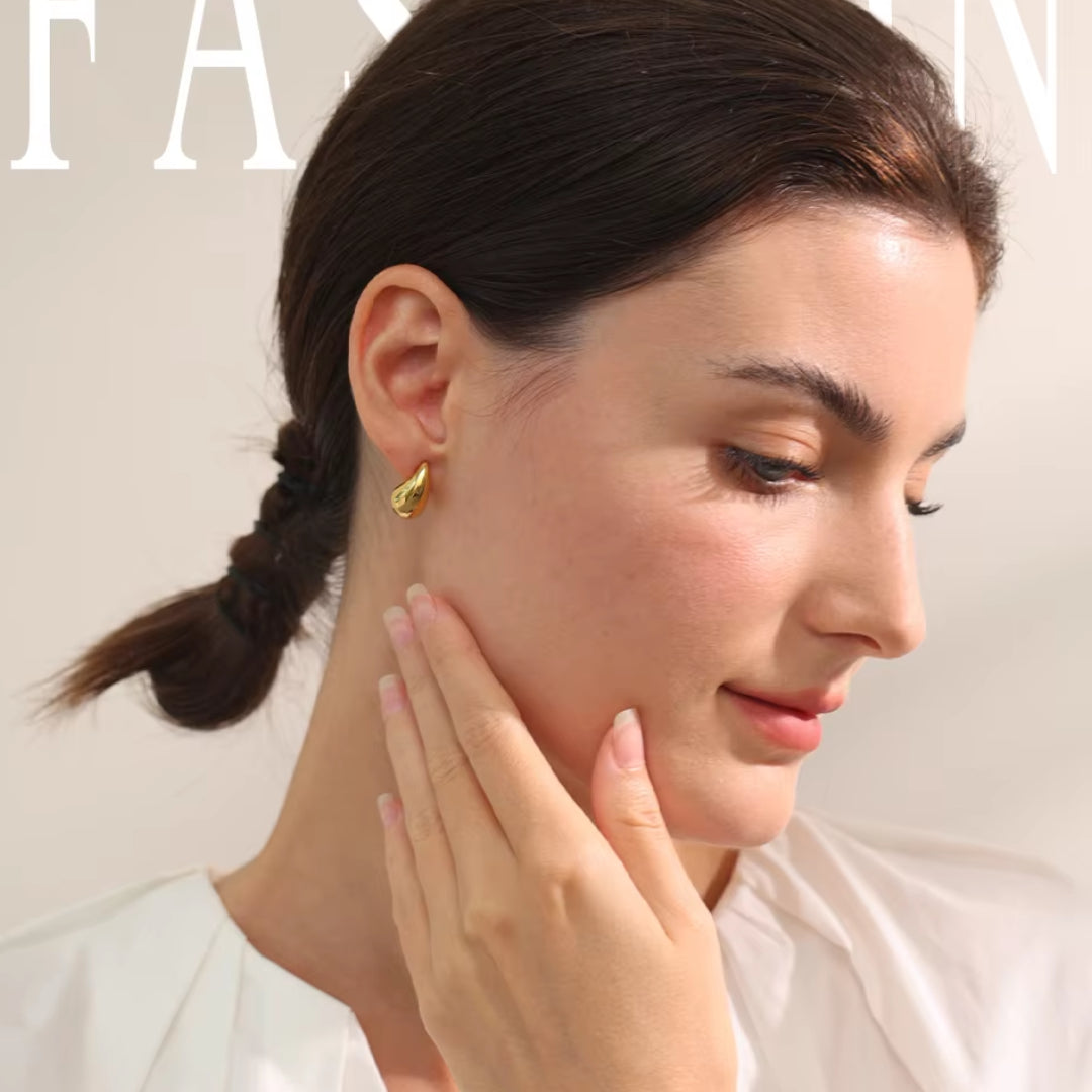 pendientes de gota, pendientes huecos, pendientes de acero inoxidable, pendientes oro 18k, joyería de moda, pendientes resistentes al agua, pendientes de diseño moderno, pendientes elegantes, pendientes ligeros, joyas personalizadas.