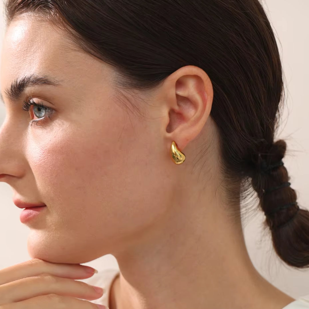 pendientes de gota, pendientes huecos, pendientes de acero inoxidable, pendientes oro 18k, joyería de moda, pendientes resistentes al agua, pendientes de diseño moderno, pendientes elegantes, pendientes ligeros, joyas personalizadas.