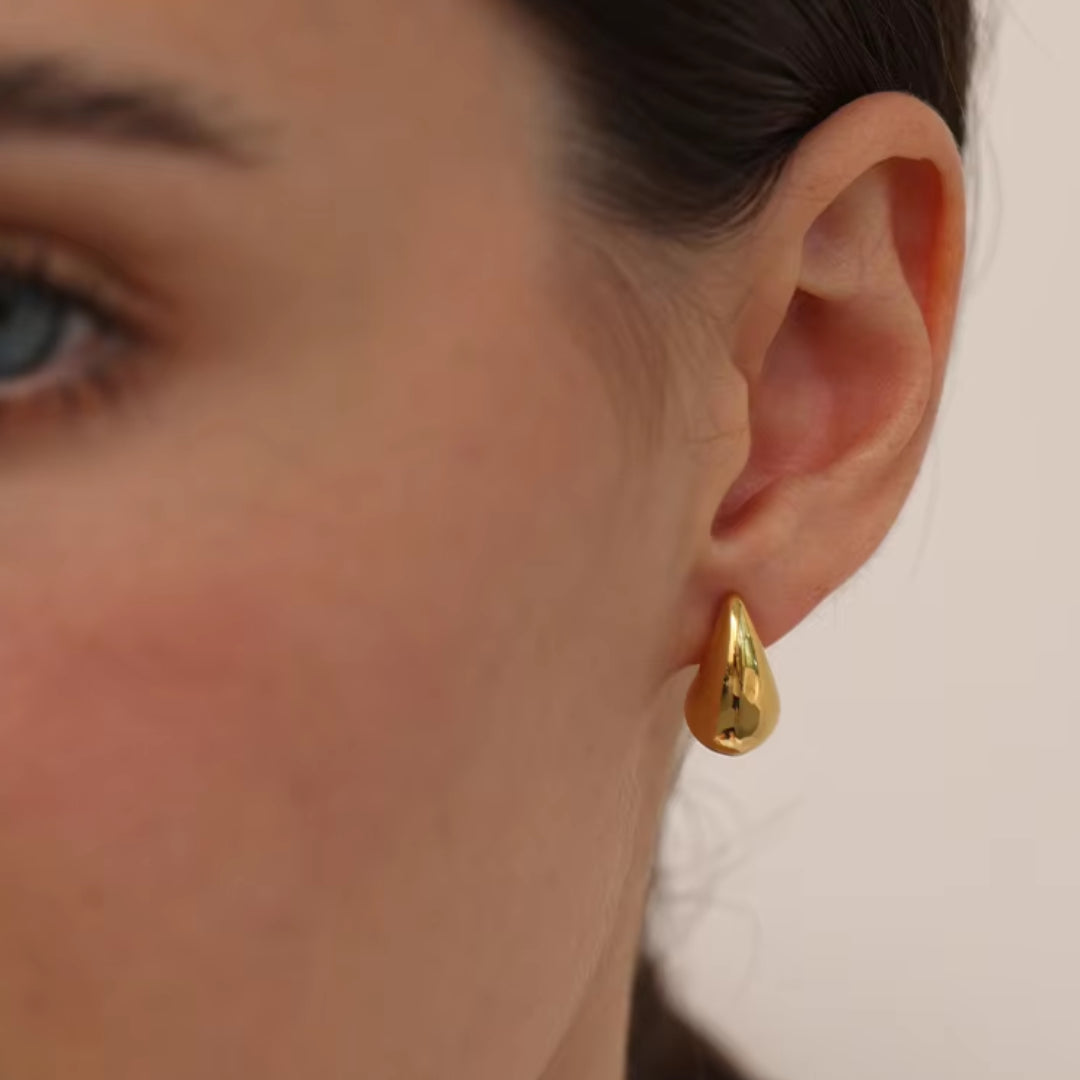 pendientes de gota, pendientes huecos, pendientes de acero inoxidable, pendientes oro 18k, joyería de moda, pendientes resistentes al agua, pendientes de diseño moderno, pendientes elegantes, pendientes ligeros, joyas personalizadas.