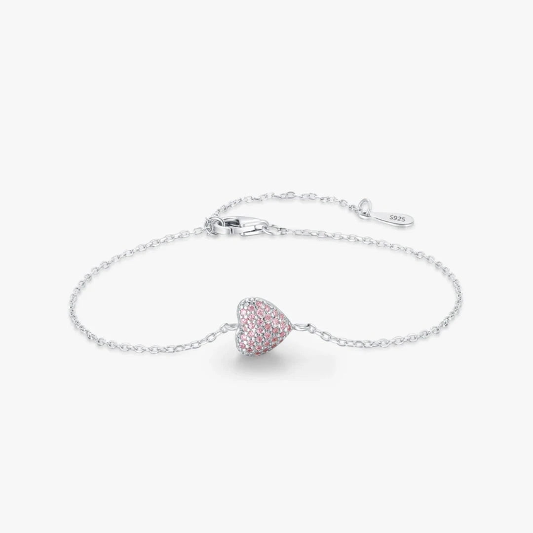 pulsera ajustable con corazón, pulsera de circonia rosa, pulsera ajustable de circonia, pulsera con corazón de circonia, joyería con circonia rosa, pulsera elegante con corazón, pulsera de moda ajustable, pulsera con piedra rosa, joyería de calidad, pulsera de diseño con circonia, accesorio ajustable, pulsera de amor, pulsera de corazón elegante