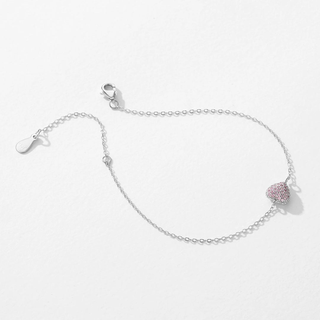 pulsera ajustable con corazón, pulsera de circonia rosa, pulsera ajustable de circonia, pulsera con corazón de circonia, joyería con circonia rosa, pulsera elegante con corazón, pulsera de moda ajustable, pulsera con piedra rosa, joyería de calidad, pulsera de diseño con circonia, accesorio ajustable, pulsera de amor, pulsera de corazón elegante