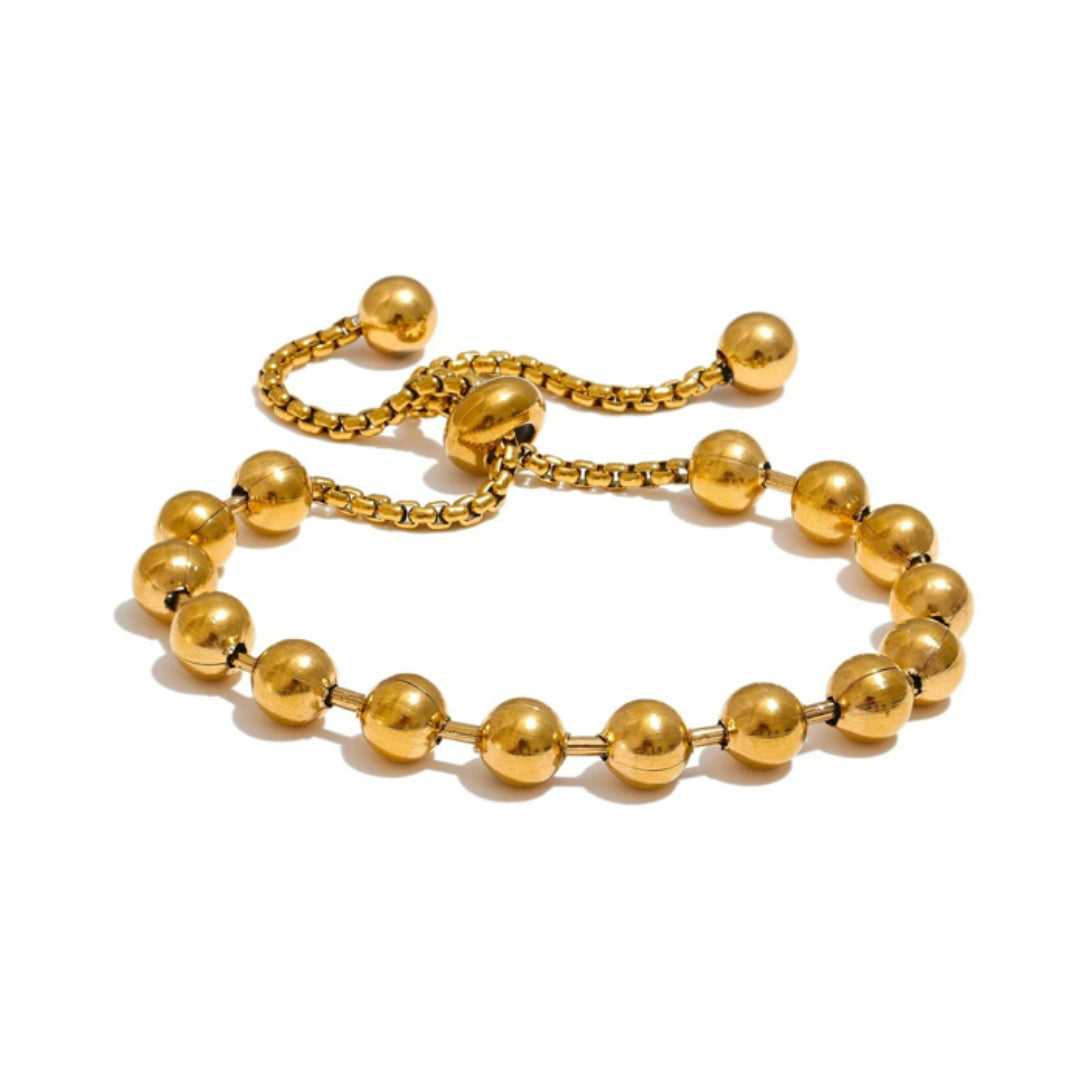 Pulsera Verano Áureo cuentas ajustables oro 18k verano – lenorajewelry.com/pulsera-verano-aureo-oro-18k
pulsera verano, joyería oro 18k, acero inoxidable, pulsera de cuentas, joyería diaria, joyas resistentes agua, regalo mujer elegante, moda playera, accesorios ajustables, Lenora Jewelry