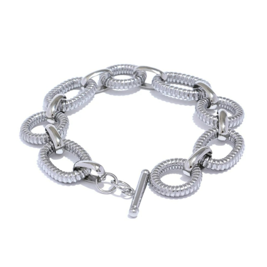 BoldLink Bracelet, pulsera unisex, pulsera de cadena ovalada, acero inoxidable 316L, joyería chapada en oro 18K, pulsera de diseño audaz, accesorio elegante para hombres, accesorio elegante para mujeres, pulsera de textura metálica, Lenora Jewelry, joyería de declaración

