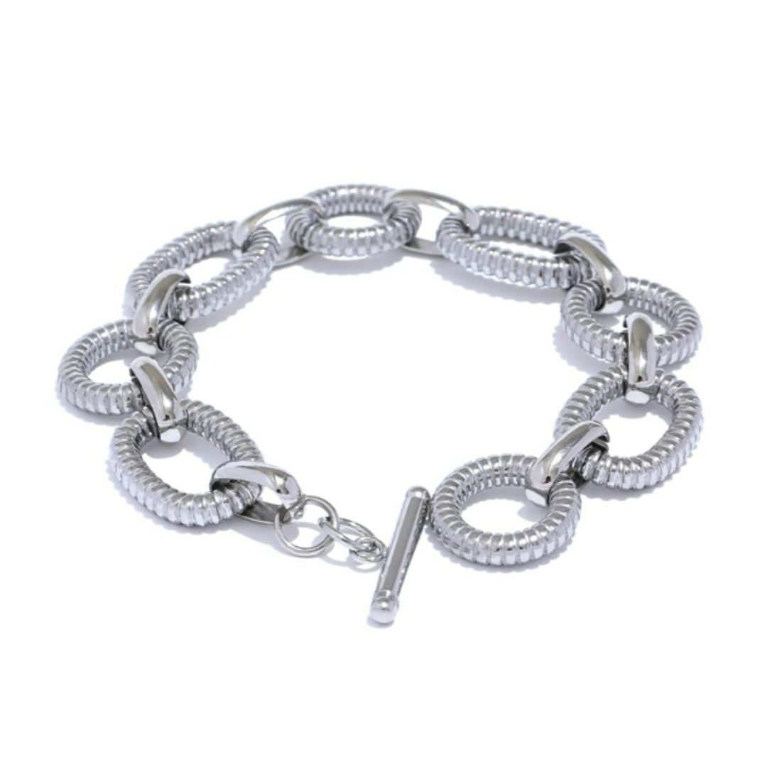 BoldLink Bracelet, pulsera unisex, pulsera de cadena ovalada, acero inoxidable 316L, joyería chapada en oro 18K, pulsera de diseño audaz, accesorio elegante para hombres, accesorio elegante para mujeres, pulsera de textura metálica, Lenora Jewelry, joyería de declaración

