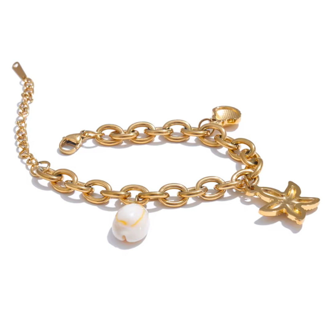 OceanGlow Charm Bracelet, pulsera de conchas naturales, pulsera con estrellas de mar, joyería de verano, pulsera resistente al agua, joyería chapada en oro 18K, pulsera ajustable para mujeres, Lenora Jewelry, accesorios para vacaciones, pulsera con diseño de océano