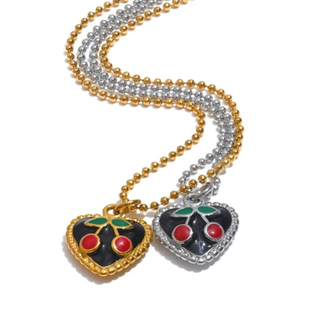 Collar dorado con corazón negro esmaltado y cereza en detalle
https://lenorajewelry.com/collar-corazon-negro-cereza-acero-inoxidable
